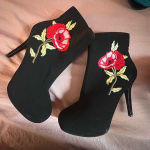 Madeline Stuart high heel booties with rose on them 9 1/2